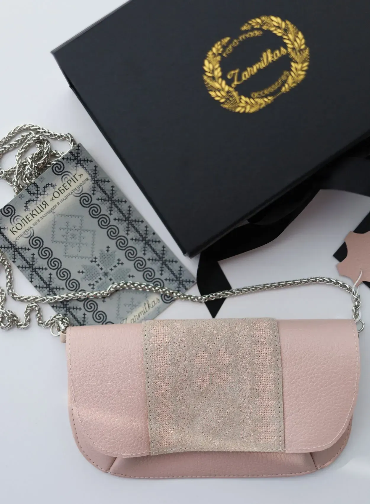 Mini-pochette en cuir "Talisman" poudré