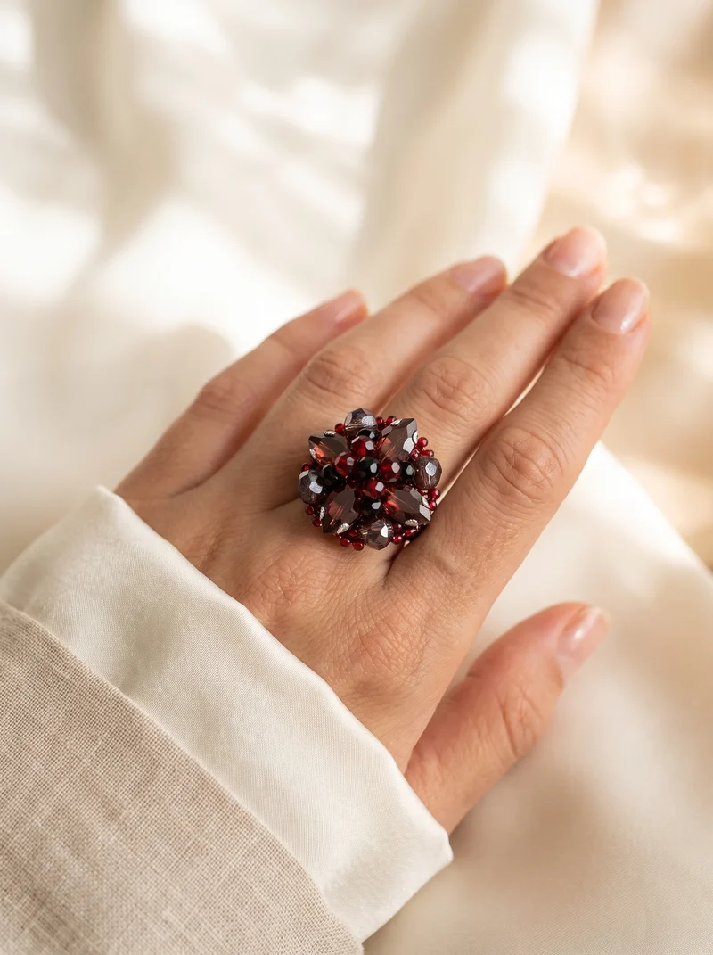 Bague à quatre pierres, fanée